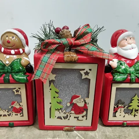 BOXED SET OF 3 CHRISTMAS PRE LIT CERAMIC ORNIMENTS 