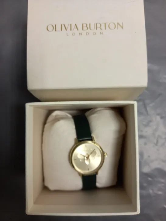 BOXED OLIVIA BURTON LONDON LADIES WATCH WITH GOLD COLOURED BEE DESIGN FACE AND GREEN LEATHER STRAP