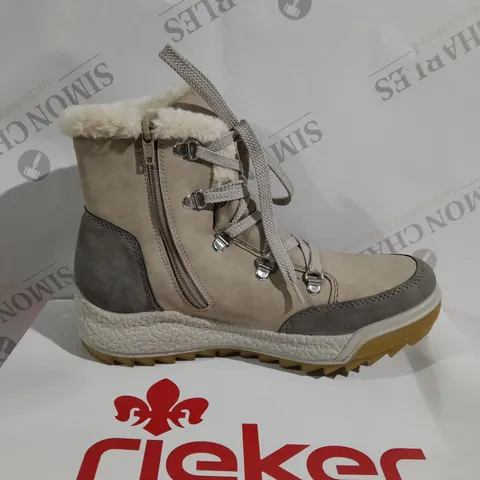 BOXED PAIR OF RIEKER ANTISTRESS WARM WATER RESISTANT HIKING BOOTS IN CREAM - SIZE 5