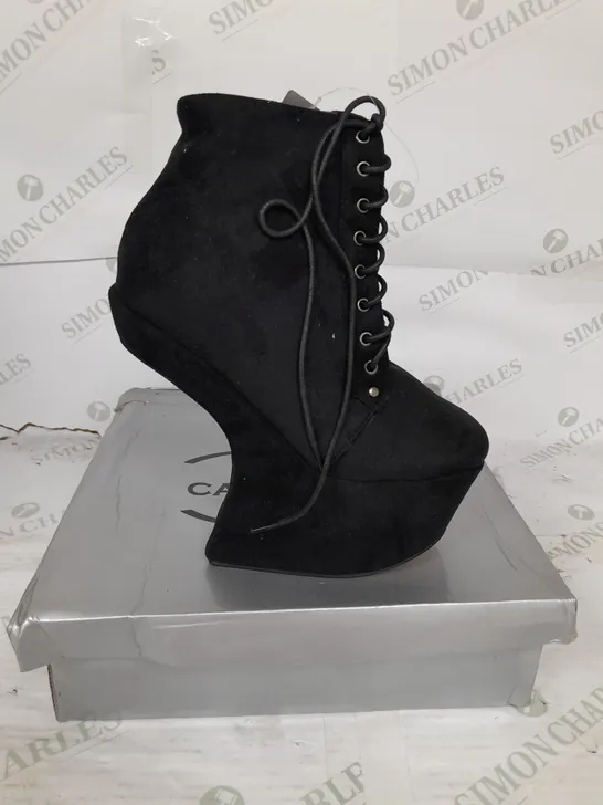 BOXED PAIR OF CASANDRA PLATFORM LACE UP HEELED BOT IN BLACK SUEDE SIZE 3