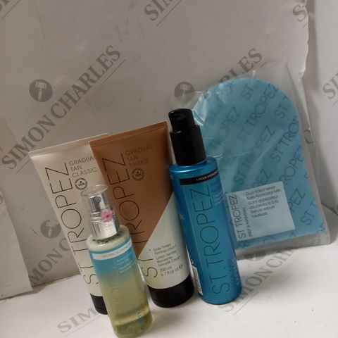LOT OF 5 ASSORTED ST. TROPEZ PRODUCTS TO INCLUDE BRONZING FACE MIST, GRADUAL TINTED TAN LOTION, DUAL-SIDED APPLICATOR MITT, ETC