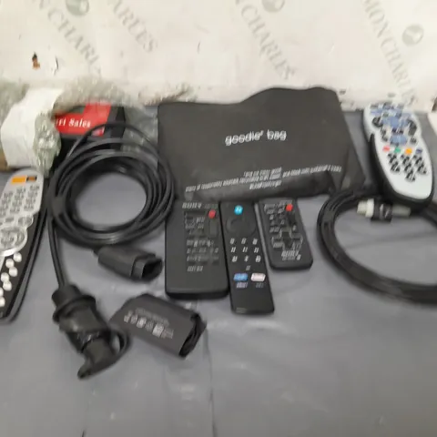 LOT OF ASSORTED HOUSEHOLD ITEMS TO INCLUDE ASSORTED REMOTE CONTROLS, CABLES AND AUDIO WIRES