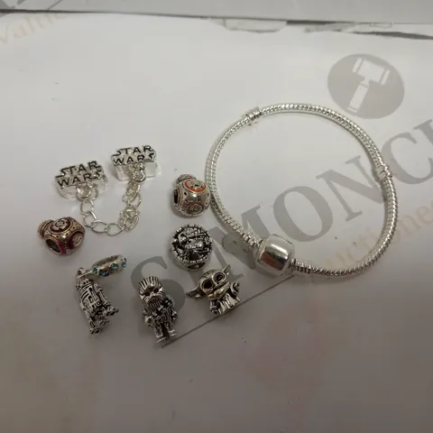 SILVER EFFECT CHARM BRACELET WITH ASSORTED STAR WARS CHARMS 