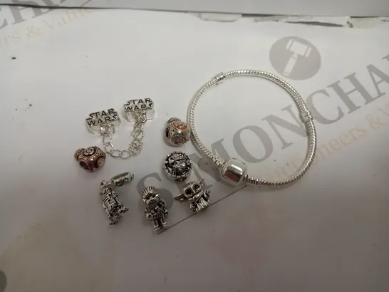 SILVER EFFECT CHARM BRACELET WITH ASSORTED STAR WARS CHARMS 