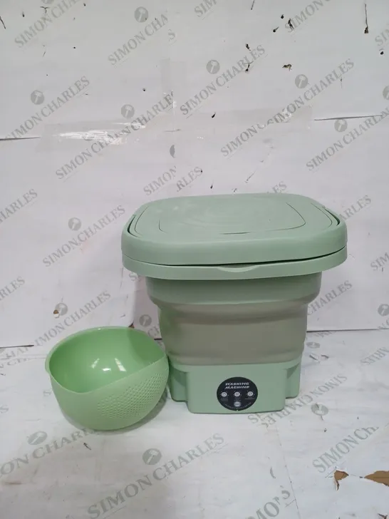 BOXED FOLDING WASHING MACHINE IN LIME