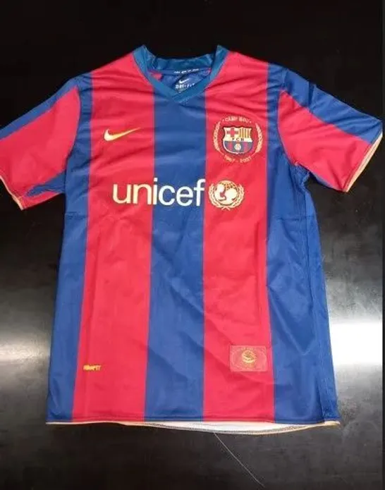 BARCELONA FC HOME JERSEY SIGNED BY LIONEL MESSI WITH CERTIFICATE OF AUTHENTICITY