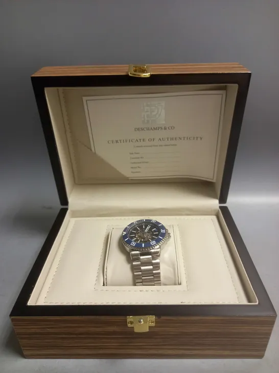 BOXED DECHAMPS&CO MECHANICAL WATCH IN BLUE/SILVER