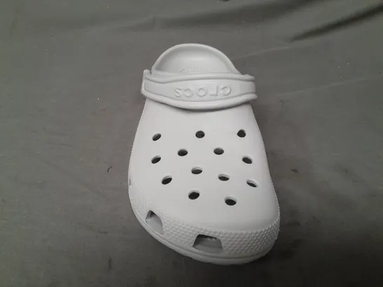 PAIR OF CROCS CLASSICS IN GREY UK SIZE M5/W6