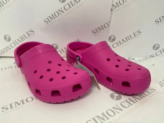 PAIR OF PINK CROCS SIZE M8 W10