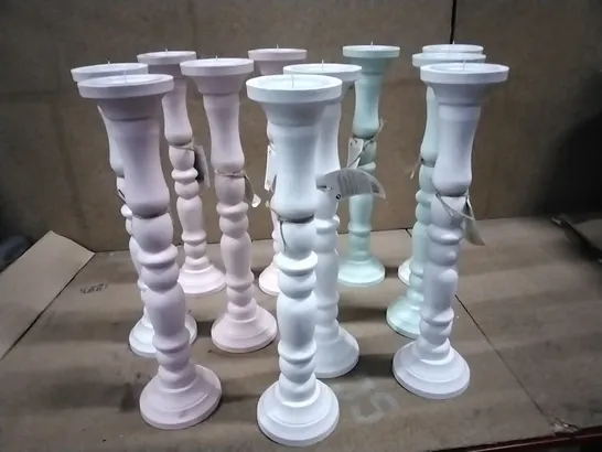 BOX CONTAINING 11 CANDLAAR CANDLE HOLDER PEDESTALS 