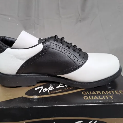 BOX OF APPROXIMATLY 12 BLACK AND WHITE TOP LINE GOLF SHOES IN VARIOUS SIZE 