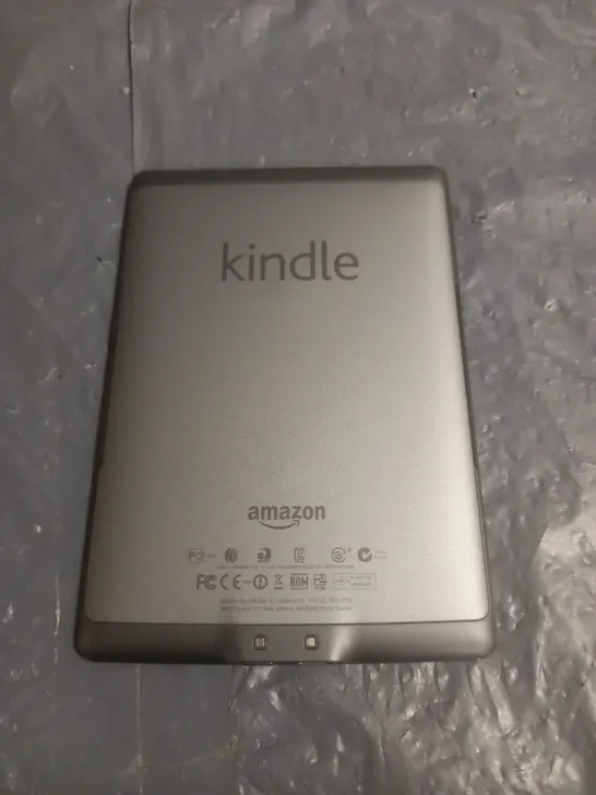 UNBOXED KINDLE DO1100 E-READER IN SILVER