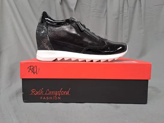 BOXED PAIR OF RUTH LANGSFORD WEDGE TRAINERS IN BLACK SIZE 4