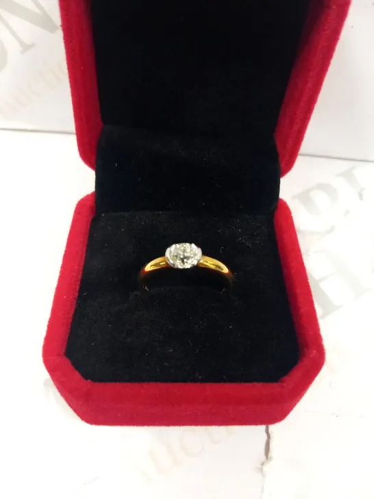 18CT GOLD SOLITAIRE RING SEMI RUB OVER SET WITH A DIAMOND WEIGHING +0.73CT