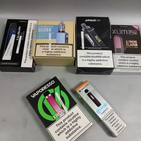 BOX OF APPROXIMATELY 10 ASSORTED E-CIGARATTES TO INCLUDE UWELL, INNOKIN, OXVA ETC