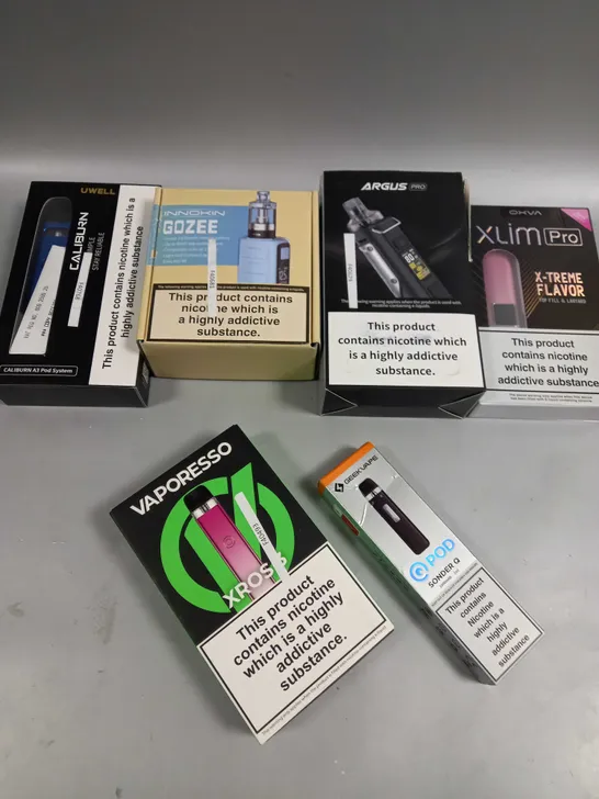 BOX OF APPROXIMATELY 10 ASSORTED E-CIGARATTES TO INCLUDE UWELL, INNOKIN, OXVA ETC