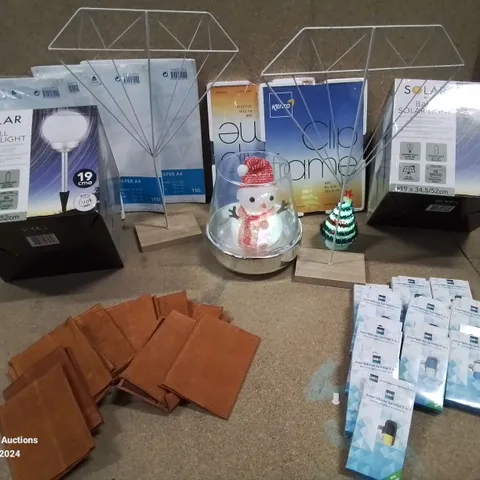 MIXED LOT TO INCLUDE, X4 SOLAR BALL LIGHTS,APPROXIMATELY 200 PASSPORT CASES, LARGE NUMBER OF SMARTPHONE SPLITTER CABLES ETC