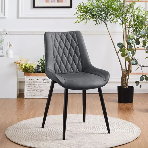 A BOXED PAIR OF GREY UPHOLSTERED DINING CHAIRS